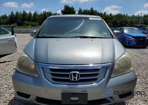2010 Honda Odyssey Exl z USA, uszkodzony, nr VIN 5FNRL3H79AB077745